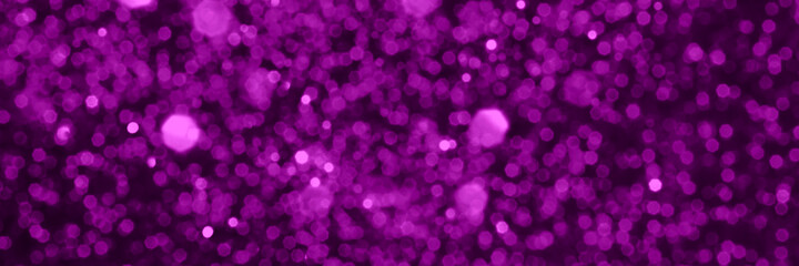 Velvet violet sparkling glitter background, christmas texture. Holiday lights. Abstract defocused...