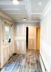 New sheetrock walls and ceiling with new tile floor in residential home