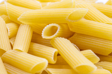 Close-up Raw penne pie. horizontal view