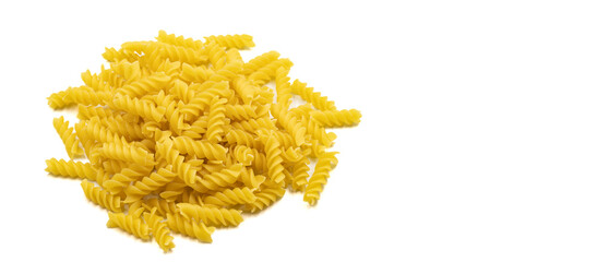 Raw auger pasta isolated on white background. Close-up. Empty space for text. Copy space