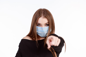 Young girl in a protective mask from the virus on a white background