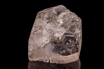 macro mineral stone Topaz on a black background