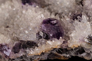 macro mineral fluorite stone on black background