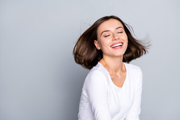 Photo of cool brunette millennial lady laugh wear white jumper isolated on grey color background