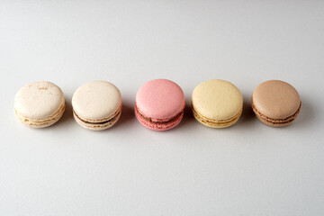 Five macarons of different flavors
