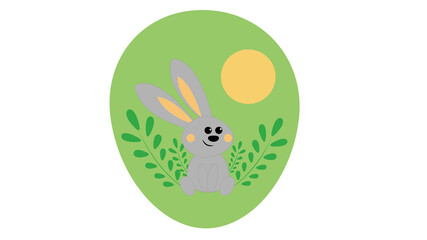 The baby rabbit is sitting in the grass under the sun