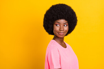 Profile side photo of young attractive black girl happy positive smile look empty space isolated over yellow color background