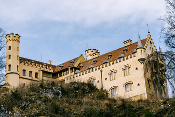 Fototapeta na wymiar Hohenschwangau Castle on a hill near the town of Fussen. Germany