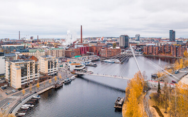 Aerial autumn landscape with bridge Laukonsilta in center of Tampere, Finland.