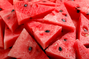 Delicious fresh watermelon slices as background, closeup