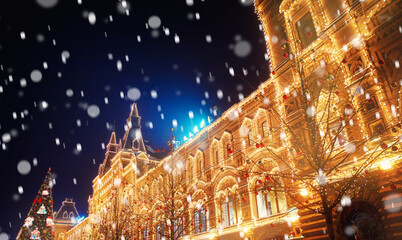 Winter night light Moscow Red square with snow. Christmas panorama Russia holidays GUM new year background bokeh