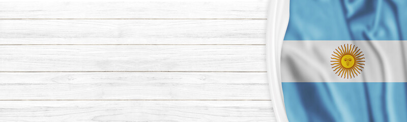 Argentina flag on white clapboard background with copy space