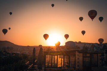 Landscape of hot air balloons taking flight