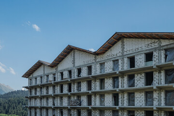 Unfinished building in a mountainous area.