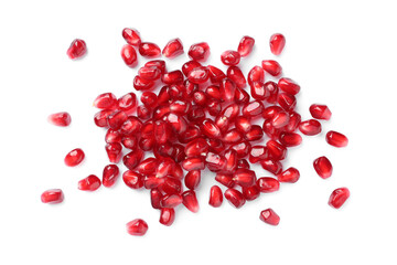 Tasty pomegranate seeds on white background, top view