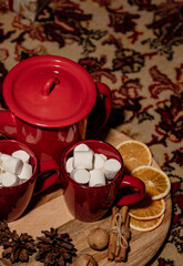 red teapot and cups in Christmas style