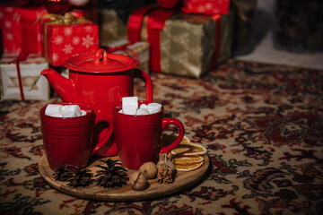 red teapot and cups in Christmas style