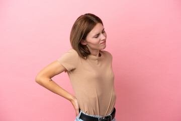 Young English woman isolated on pink background suffering from backache for having made an effort