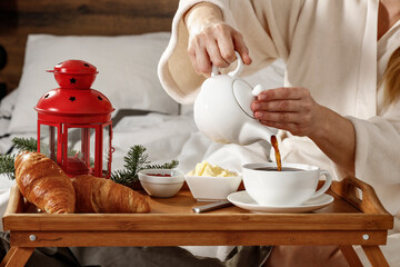 Breakfast in bed on a beautiful winter's day, relaxation and free space 