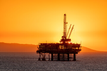 Offshore oil platform at dusk