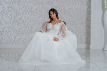 Girl with wedding dress posing for photo shoot