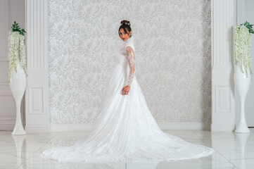 Girl with wedding dress posing for photo shoot