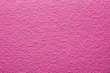 Pink wall background. Vibrant color cement texture. Plaster wall pattern. Spray paint backdrop.