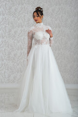 Fototapeta premium Girl with wedding dress posing for photo shoot