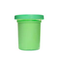 Plastic container with color play dough isolated on white
