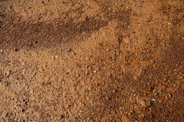 Red clay with pebbles ideal for texture and pattern
