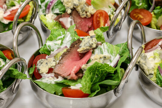 Steak And Blue Cheese Spring Green Salad At A Lunch Buffet