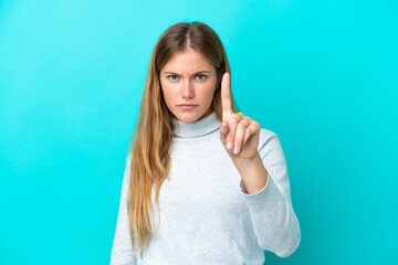 Fototapeta premium Young blonde woman isolated on blue background counting one with serious expression