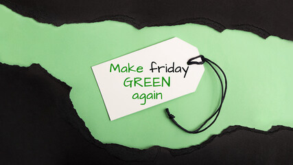 Torned paper on the green background.Call to action make black friday green again.Reducing excessive consumption.