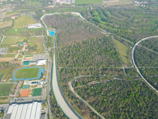 Aerial view of The Autodromo Nazionale of Monza, that is a race track located near the city of Monza, north of Milan, in Italy. Drone photography of the circuit in Monza, Lombardia, Brianza.