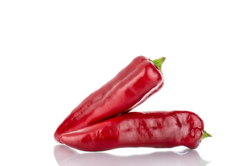 Two red sweet peppers, close-up, isolated on white.