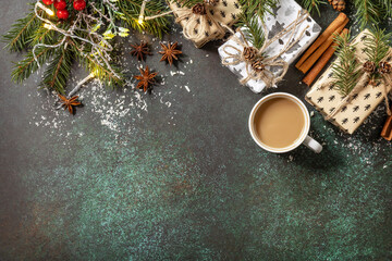 Obraz na płótnie Canvas Сup of coffee on xmas dark stone tabletop. New year or christmas concept. Flat lay.