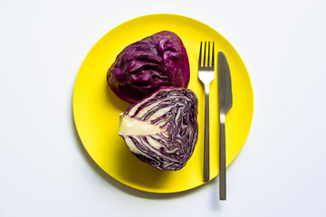 Yellow plate with cut red cabbage