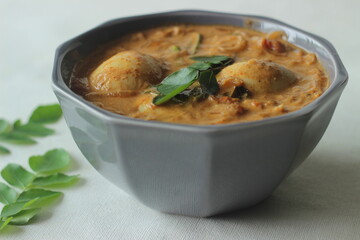 Egg curry. Boiled egg in a gravy of onions tomatos and spices. A popular side dish of south India. Also known as Mutta curry or Anda curry.