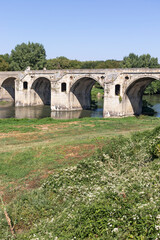 Fototapeta na wymiar Nineteenth-century bridge over the Yantra River in Byala, Bulgaria