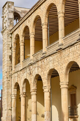 The gallery of the garden on the west facade of the Palace of El Infantado, with a double series of semicircular arches over elliptical pillars. Castilla la Mancha, Guadalajara, Spain.