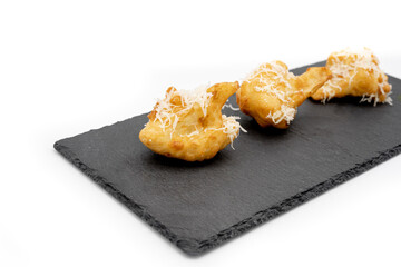 Battered and fried cauliflower with parmesan