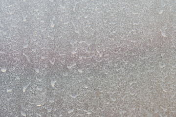 Close up dusty on the car window.
