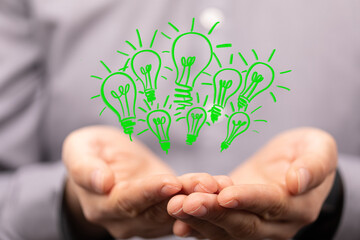 Fototapeta na wymiar Green energy innovation light bulb with future industry of power generation