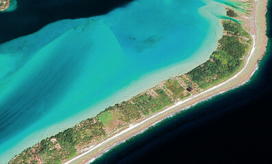 Aerial photography of bungalows and lagoons in Bora Bora French Polynesia