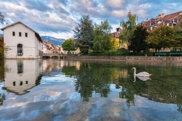 Beautiful sunset reflected in the canal of Annecy, France.