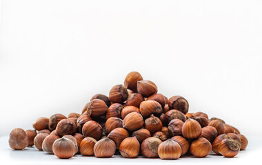 Hazelnuts in the shell. Round filbert, ripe fruit of a Corylus avellana hazel shrubs.