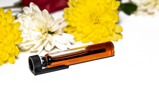 Yellow and white kaites and a capsule with celandine. Remedy for warts on the skin