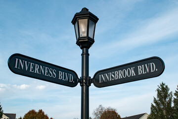 Lamppost and street signs in a neighborhood in Carmel, Indiana.