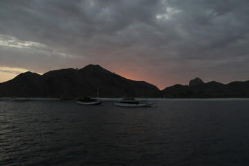 Sunset behind the hills of Padar Island