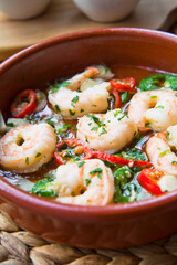 Spanish gambas tapas -  freshly cooked king prawns with garlic, chili and parsley.